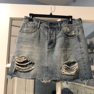 Distressed denim skirt